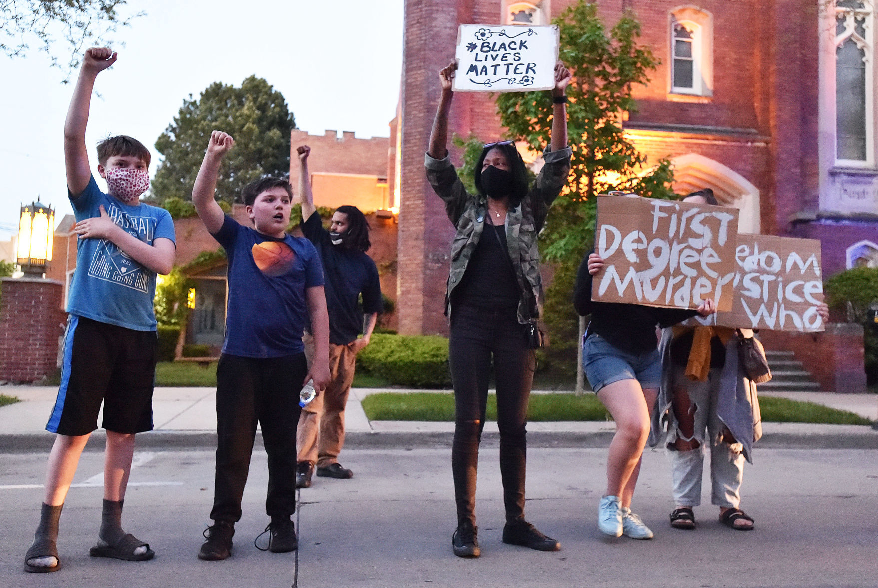 Fists up outside Racine County Jail